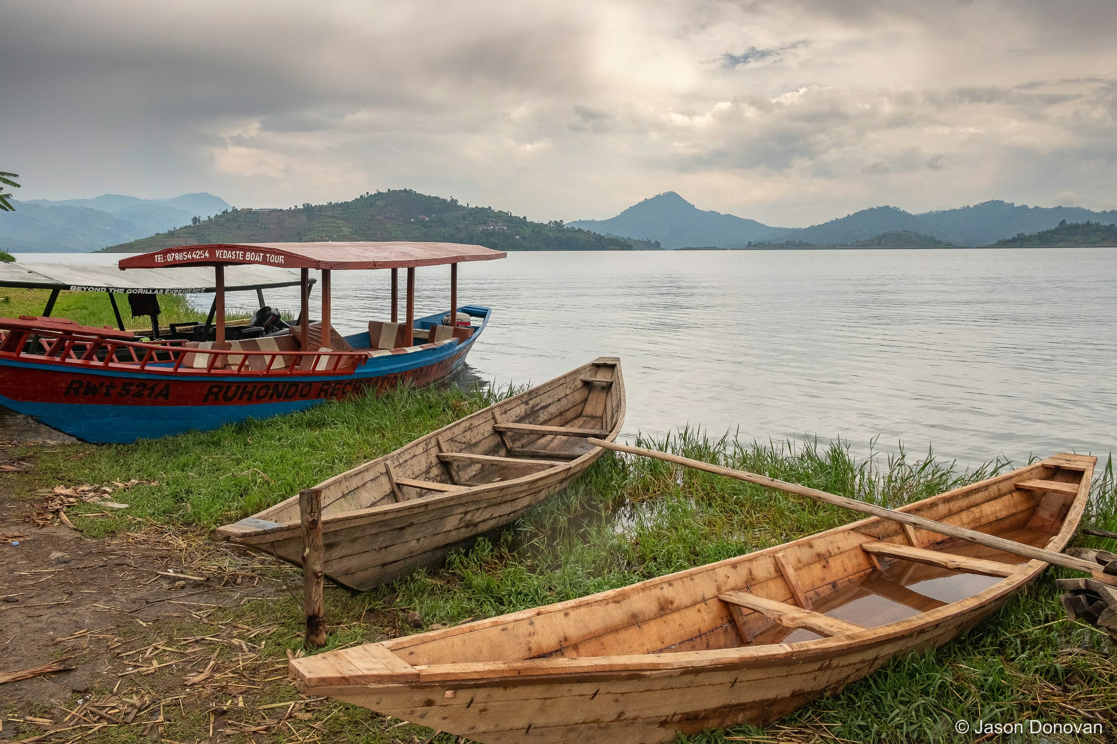 Boats line the shores of Lake Kivu Rwanda photography by Jason Donovan