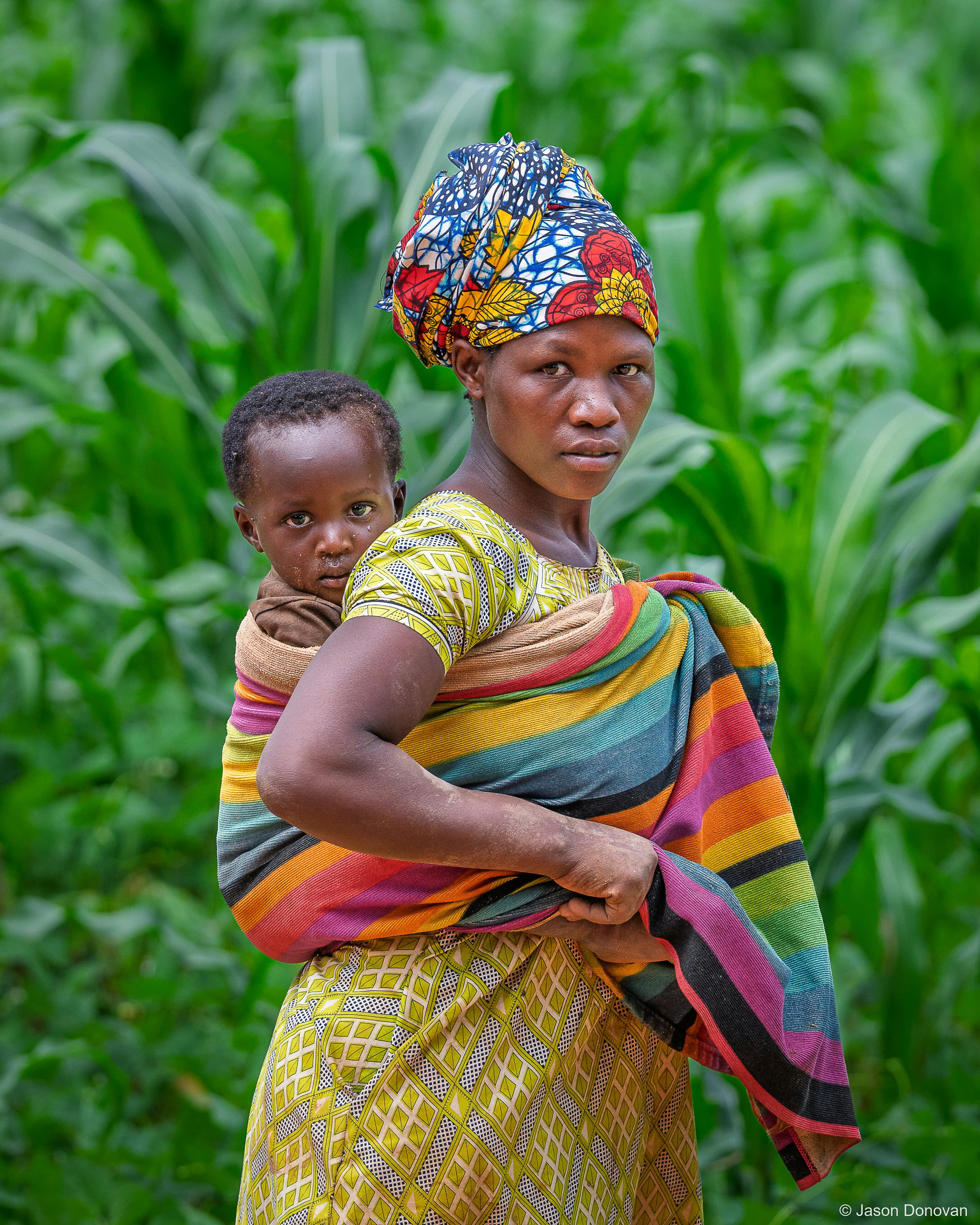 Local mother and child Lake Muhazi Rwanda photography by Jason Donovan