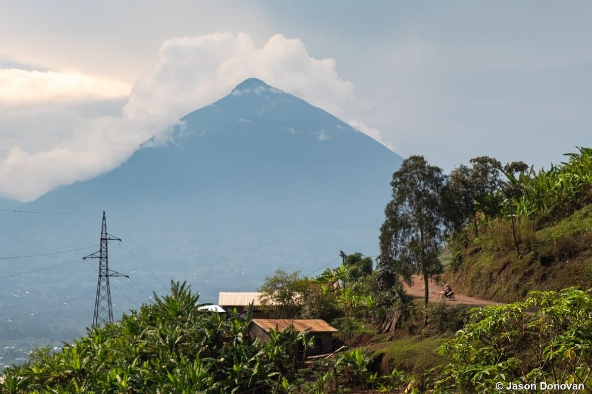 Virunga volcano with village in foreground Rwanda